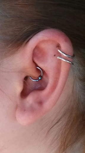 Explore ideas for hand tattoos, creative tattoo ideas in Green Bay, available at Colourbox Body Piercing Llc