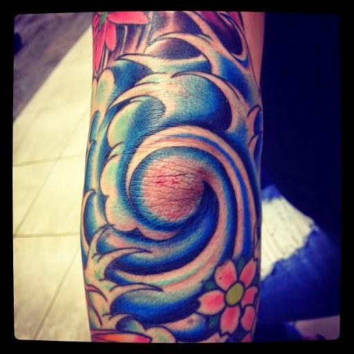 Explore blue collar tattoo ideas, creative tattoo ideas in Chandler, available at Classic Tattoo