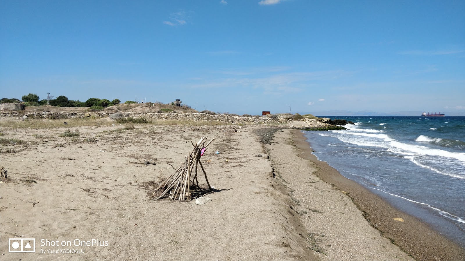 Photo of Kumkale beache with light sand &  pebble surface