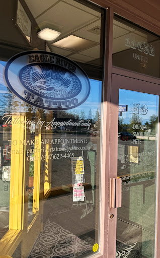 Explore male back tattoo ideas, creative tattoo ideas in Eagle River, available at Eagle River Tattoo