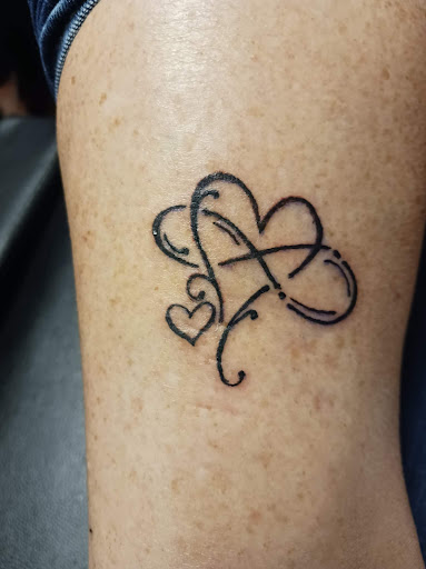Find garter belt tattoo ideas for your next unique tattoo in Mobile at Brothers Ink Tattoo Parlor