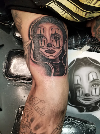 Explore back hand tattoo ideas, creative tattoo ideas in Bakersfield, available at KUSTOM CREATIONS TATTOO & PIERCING STUDIO