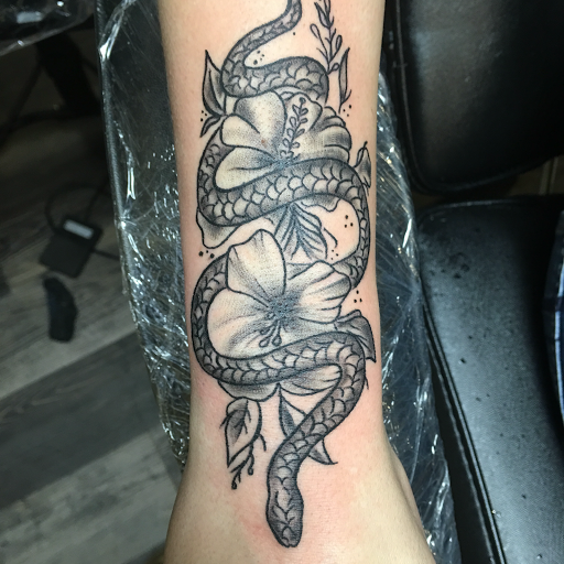 Explore forearm tattoo name ideas, creative tattoo ideas in Warner Robins, available at Untold Pain Tattoo Studio