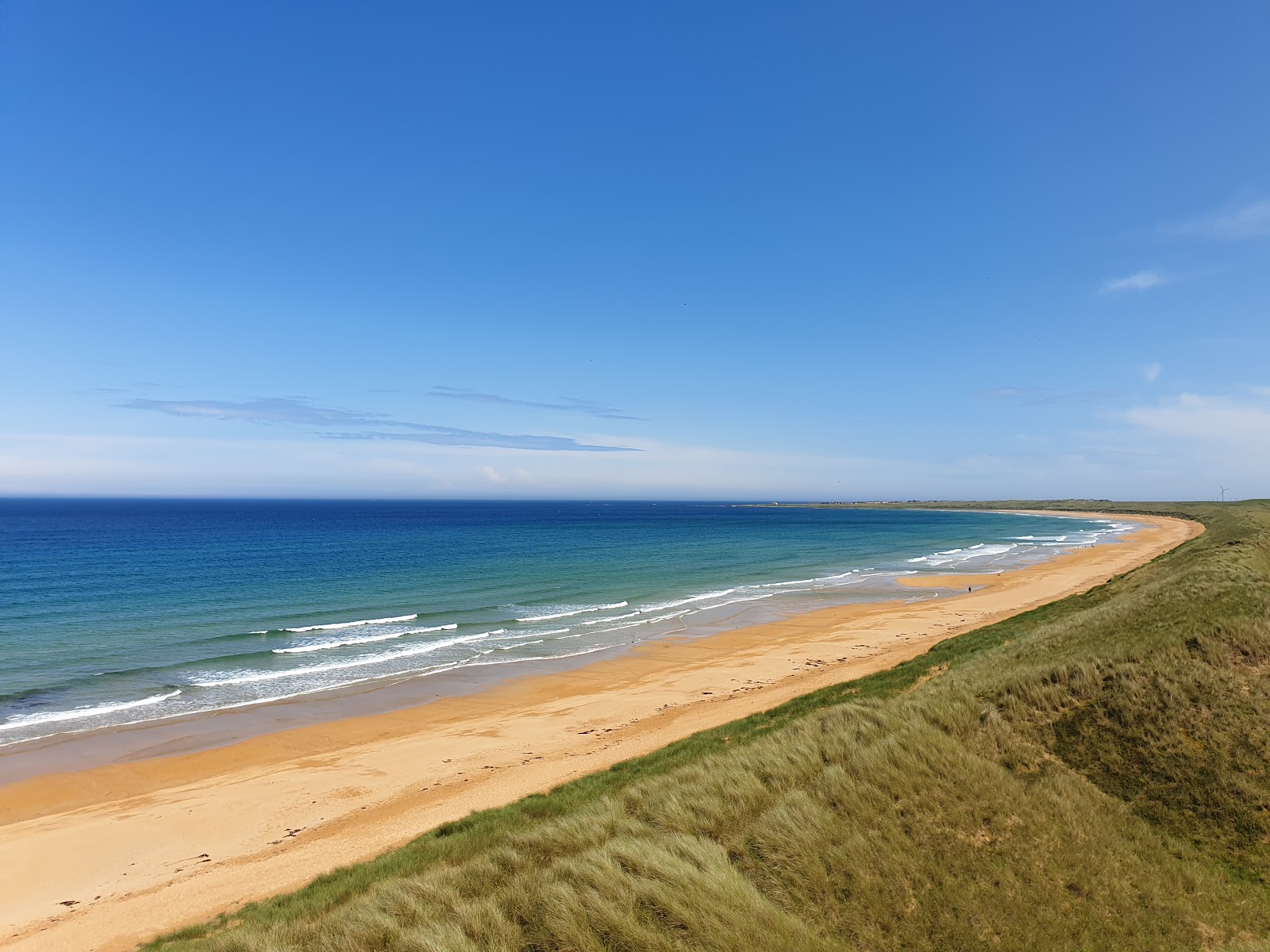 Foto de Fraserburgh Beach com areia fina e brilhante superfície