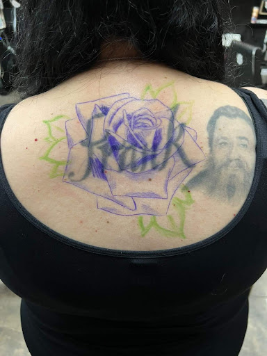 Explore neck tattoo filler ideas, creative tattoo ideas in Colton, available at knuckleheads tattoo