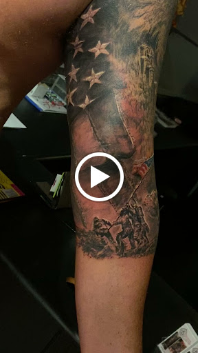 Explore watercolor flower tattoo ideas, creative tattoo ideas in Brunswick, available at Brunswick Tattoo Company