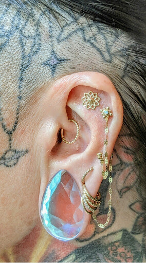 Explore blackout tattoo ideas, creative tattoo ideas in Redding, available at Velvet Orange Bodycraft