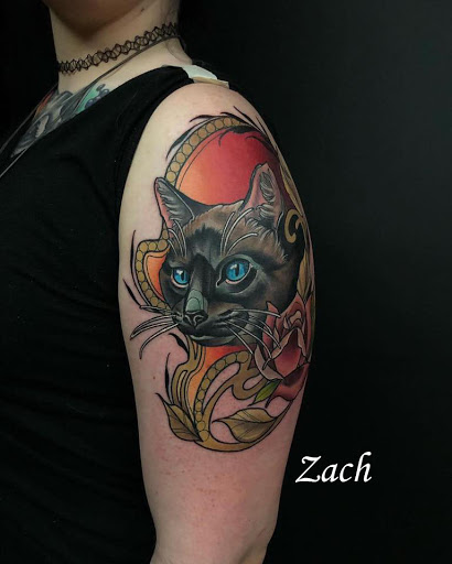 Explore trust no one tattoo ideas, creative tattoo ideas in Sanford, available at Venom Ink Tattoo