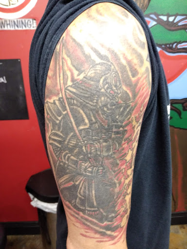 Explore 2x2 tattoo ideas for guys, creative tattoo ideas in Warren, available at Aces Tattoo & Body Piercing