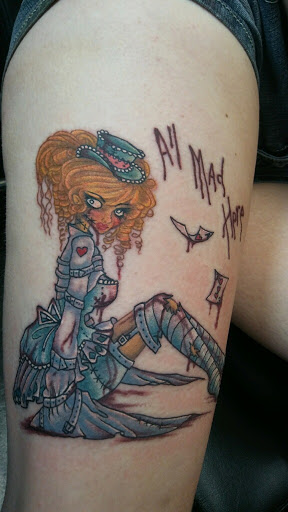 Explore filler sleeve tattoo ideas, creative tattoo ideas in Three Rivers, available at Portfolio Ink, LLC