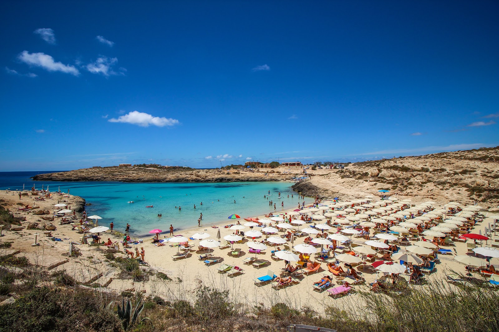 Photo of Cala Croce with turquoise pure water surface