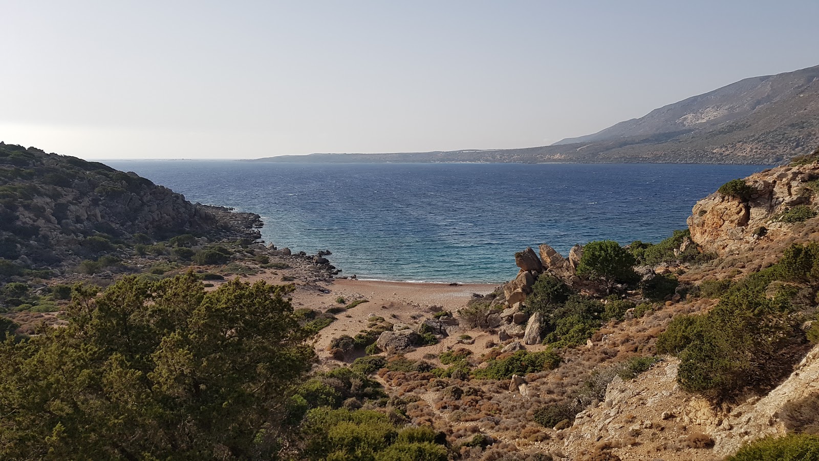 Kokkino Ammoutsaki'in fotoğrafı turkuaz saf su yüzey ile