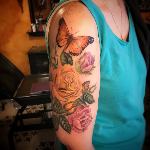 Explore small compass tattoo ideas, creative tattoo ideas in Groton, available at Black Dragon Tattoo Company