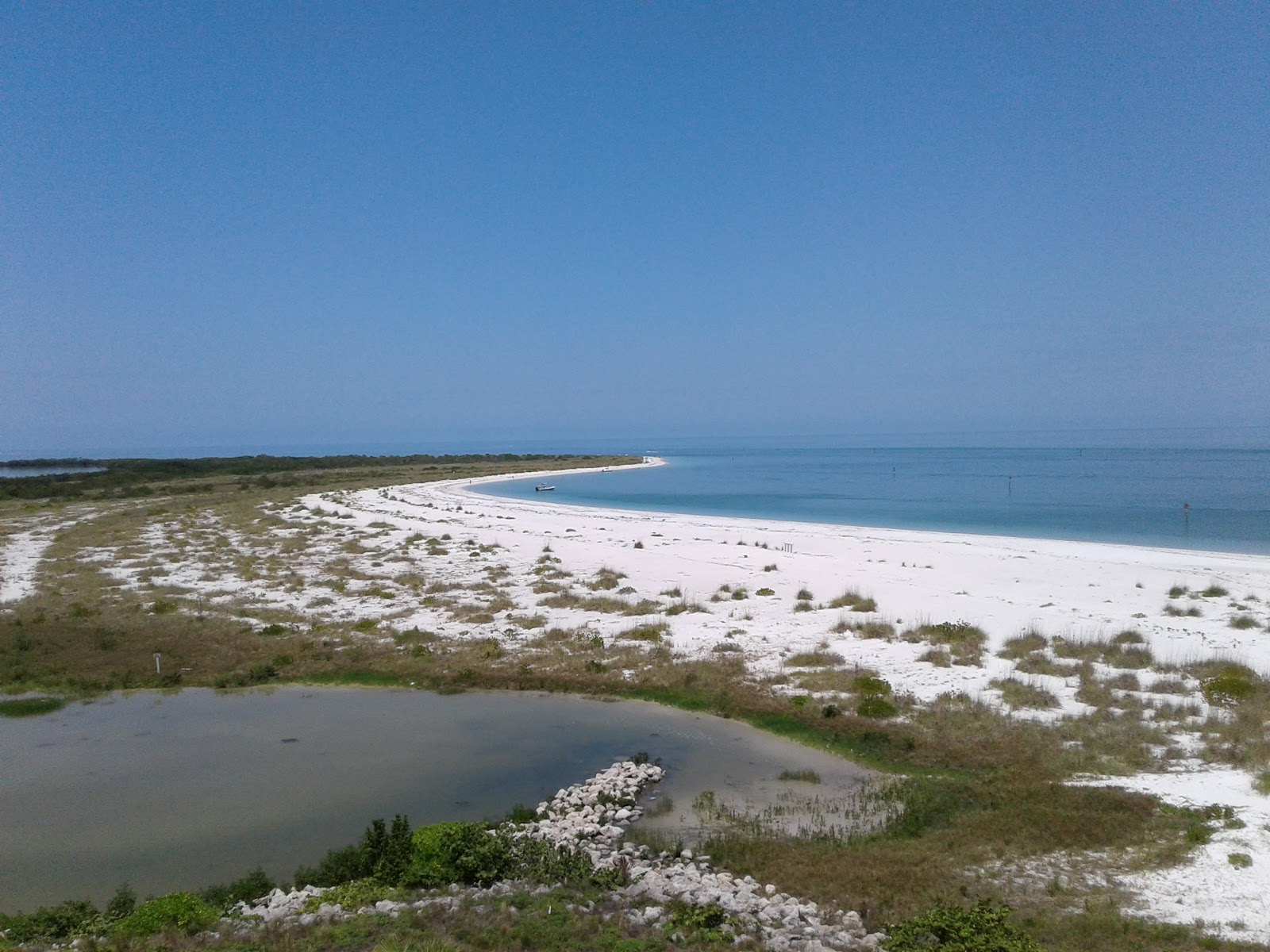 Fotografija Shell Key beach z turkizna voda površino