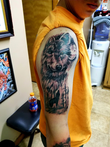 Explore hand tattoo ideas man, creative tattoo ideas in Conway, available at Primal Urge Tattoos