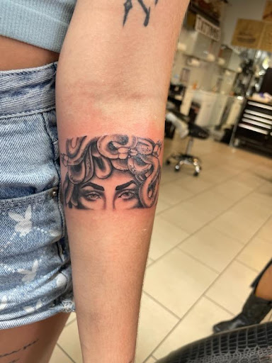 Explore small nashville tattoo ideas, creative tattoo ideas in Sarasota, available at SEVEN SINS Tattoo Studio