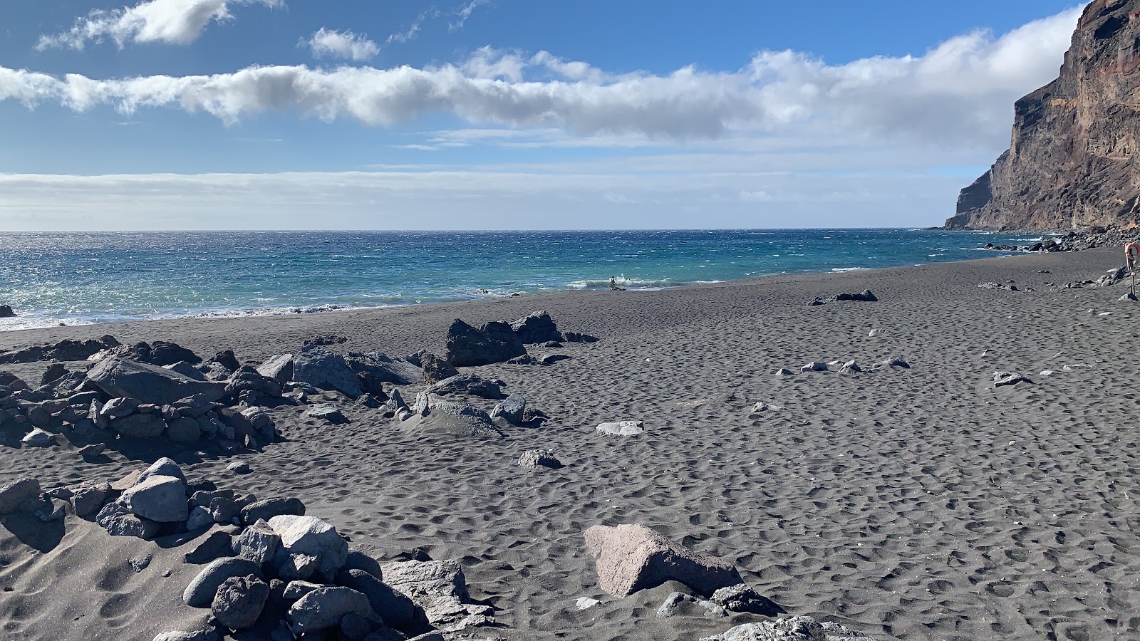 Foto di Playa del ingles con una superficie del sabbia grigia