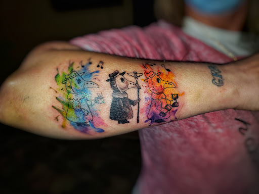 Explore flower back tattoo ideas, creative tattoo ideas in North Bend, available at The Rusty Needle Tattoo Parlor