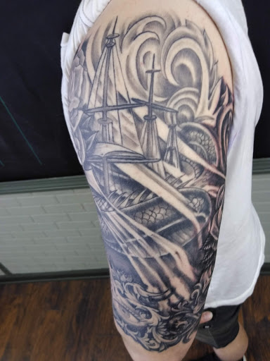 Explore adopted tattoo ideas, creative tattoo ideas in Warren, available at Aces Tattoo & Body Piercing