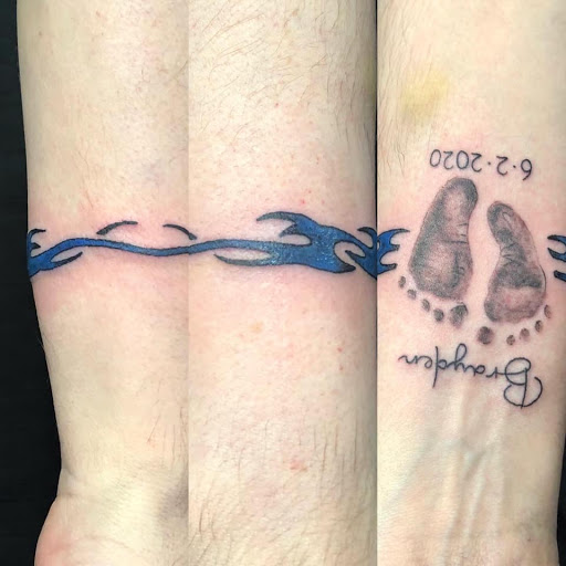 Explore cover up lower back tattoo ideas, creative tattoo ideas in Oxford, available at Victorian Ink