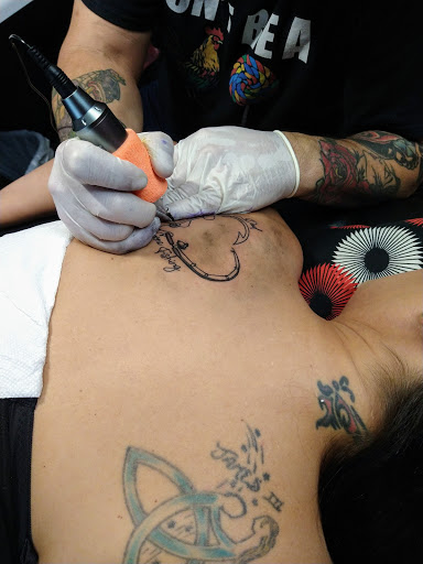 Tattoo Shop «Divine Torture», reviews and photos, 3223 Curry Ford Rd, Orlando, FL 32806, USA