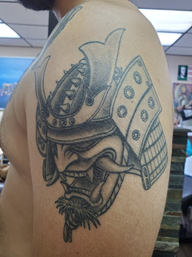 Find tattoo ideas western for your next unique tattoo in Hialeah at The Shop Tattoo Studio