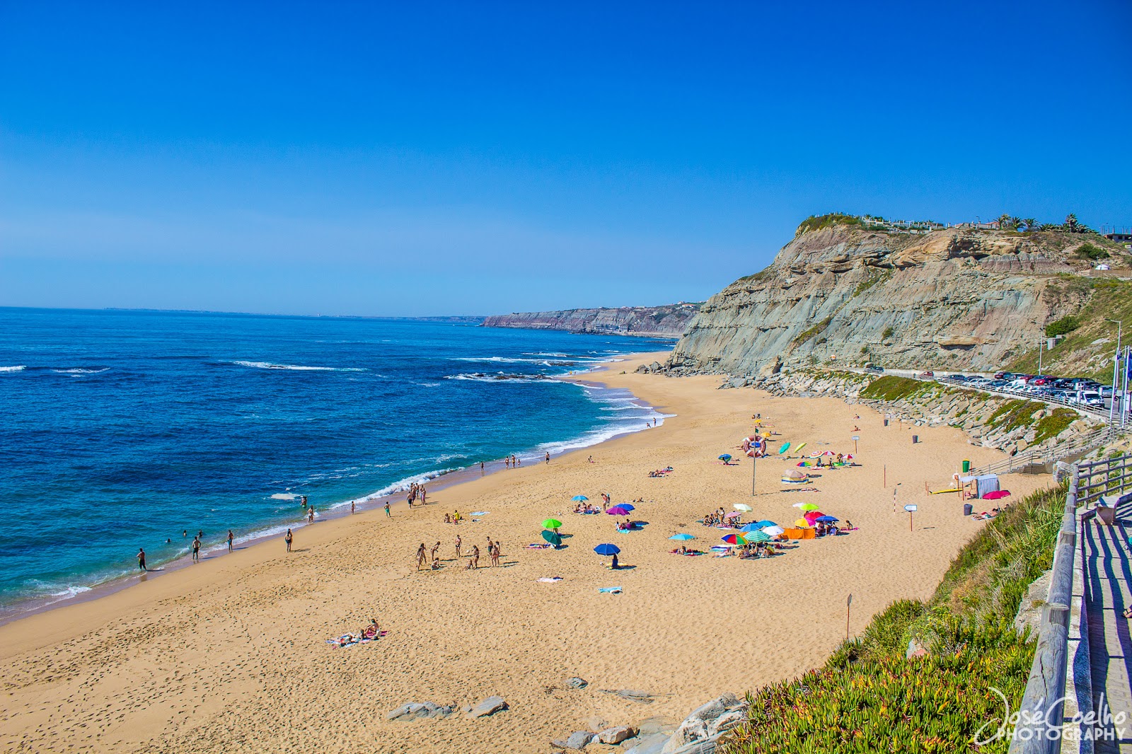 Foto van Praia de Porto Dinheiro met helder fijn zand oppervlakte