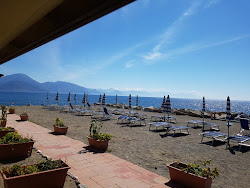 Fotografie cu Spiaggia Bussento sprijinit de stânci