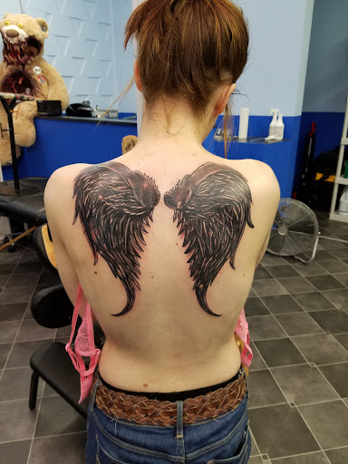 Tattoo Shop «Flesh To Fantasy Tattoo Emporium», reviews and photos, 721 S Main St, Bellefontaine, OH 43311, USA