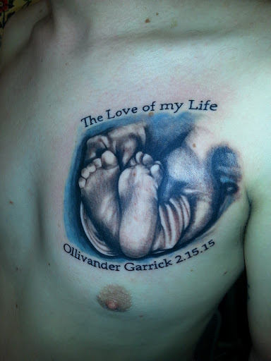 Explore thigh tattoo ideas men, creative tattoo ideas in Buffalo, available at Madd Ink Tattoo & Piercing