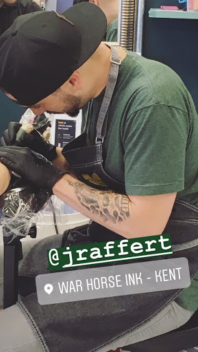 Explore women's thigh tattoo ideas, creative tattoo ideas in Kent, available at War Horse Ink