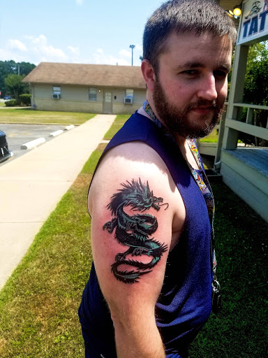 Explore women's quarter sleeve tattoo ideas, creative tattoo ideas in Conway, available at Primal Urge Tattoos