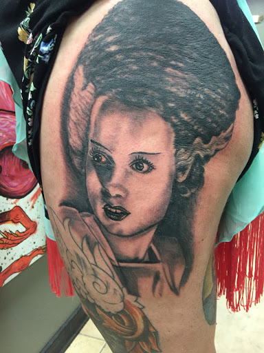 Explore tramp tattoo ideas, creative tattoo ideas in Satellite Beach, available at Rocksteady Tattoo Company