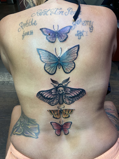 Explore hot girl tattoo ideas, creative tattoo ideas in Bullhead City, available at Smoke and Dagger Tattoo