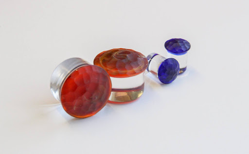 Explore automotive tattoo sleeve ideas, creative tattoo ideas in Upland, available at Laughing Buddha Body Piercing