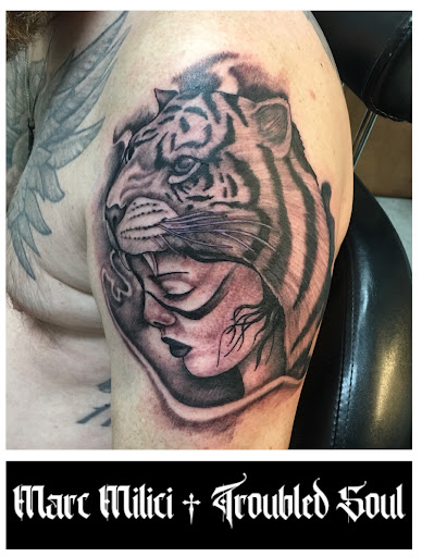 Explore front of neck tattoo ideas, creative tattoo ideas in Middletown, available at Troubled Soul Tattoo