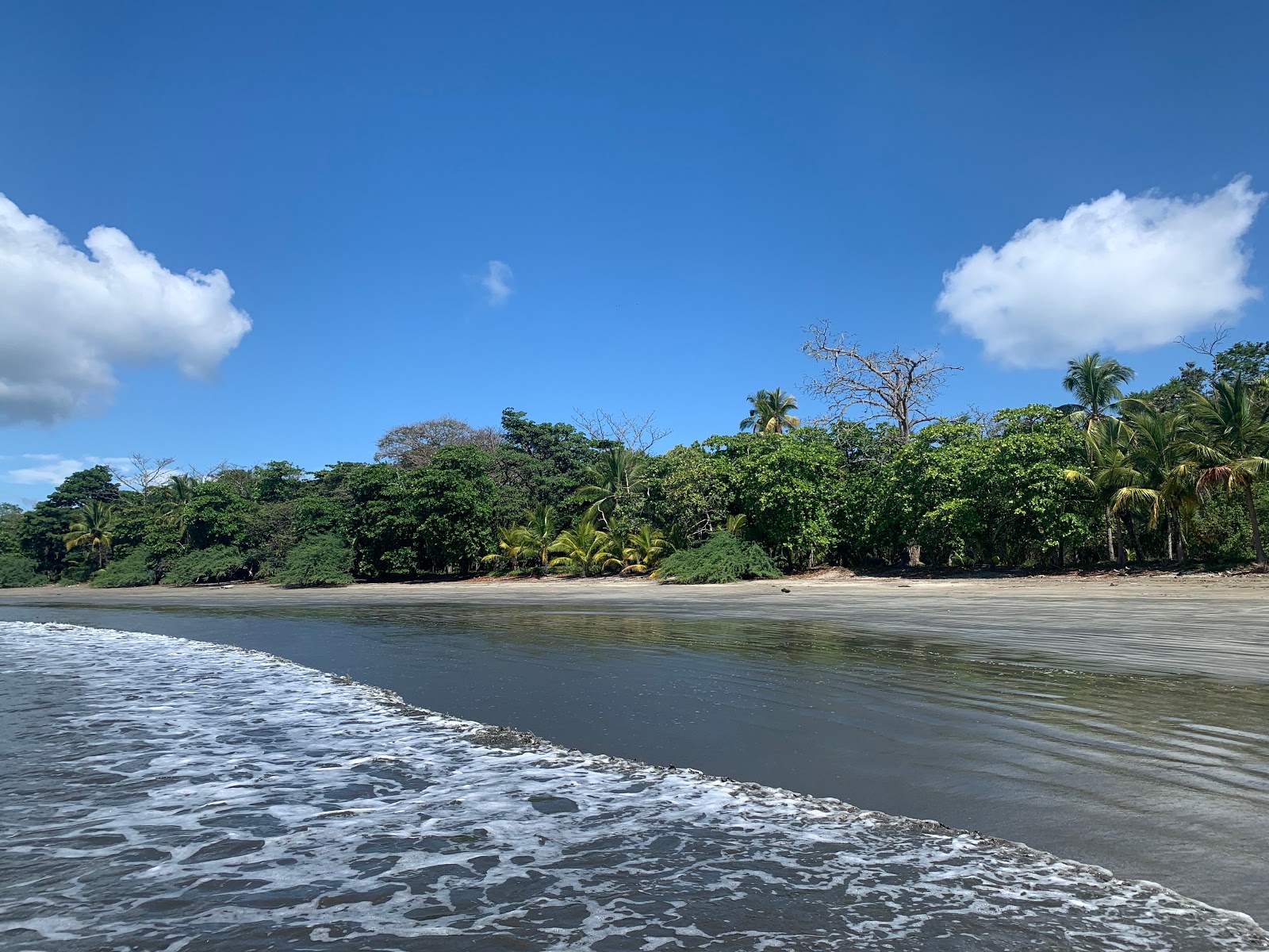 Foto van Playa Coca met beige zand oppervlakte