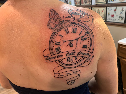 Explore mens back tattoo ideas, creative tattoo ideas in Pikeville, available at Sacred Mountain Tattoo