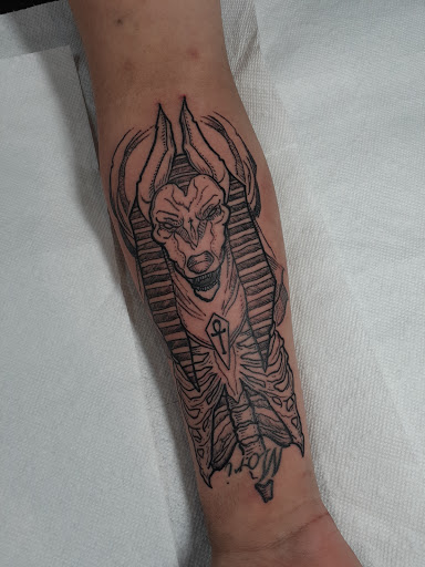 Explore tattoo ideas breast cancer ribbon, creative tattoo ideas in Arlington, available at Urbans Tattoo & Piercing Studio