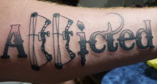 Explore under breast tattoo ideas for females, creative tattoo ideas in Ithaca, available at Kingdom Tattoo Company