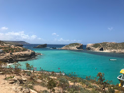 Cominotto Beach'in fotoğrafı çok temiz temizlik seviyesi ile