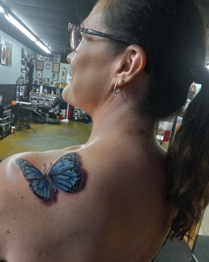 Explore small dog tattoos ideas, creative tattoo ideas in Venice, available at Ministry of Ink Tattoo & Piercing