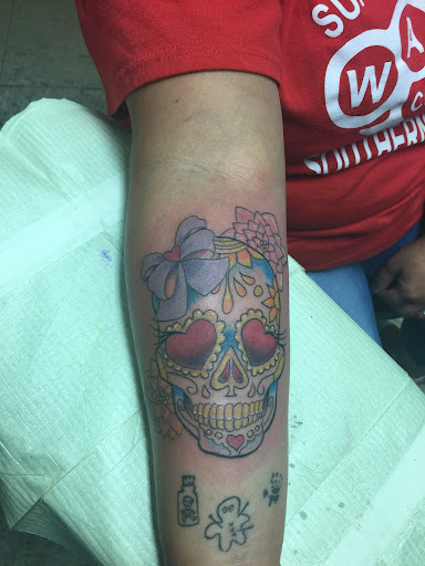 Explore miami dolphins tattoo ideas, creative tattoo ideas in Fayetteville, available at Southern Customs Tattoo Company