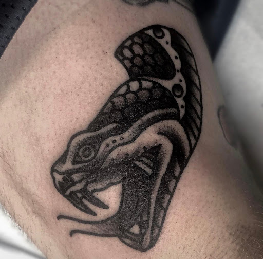 Explore thigh tattoo ideas men, creative tattoo ideas in Wilkes Barre, available at South Main Street Tattoo