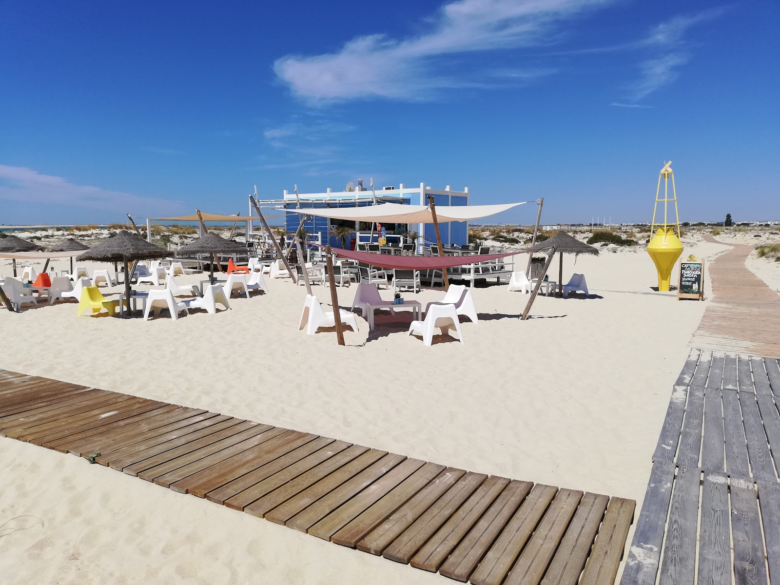 Photo de Ilha da Armona Mar avec rivage droit, long