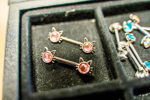 Find best friend memorial tattoo ideas for your next unique tattoo in Summerville at Exotic Impressions Body Piercing