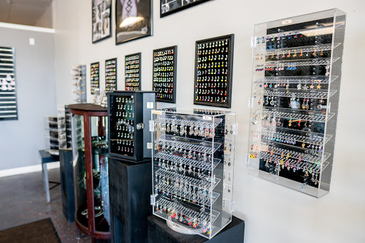 Explore cover up tattoo ideas lower back, creative tattoo ideas in Summerville, available at Exotic Impressions Body Piercing