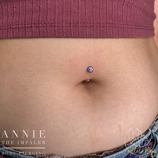 Explore tattoo ideas behind the ear, creative tattoo ideas in Bloomington, available at Crystal Moon Body Arts