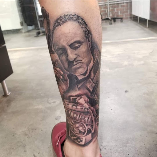 Explore floral hand tattoo ideas, creative tattoo ideas in Cocoa Beach, available at The Corner Tattoo and Piercing Studio