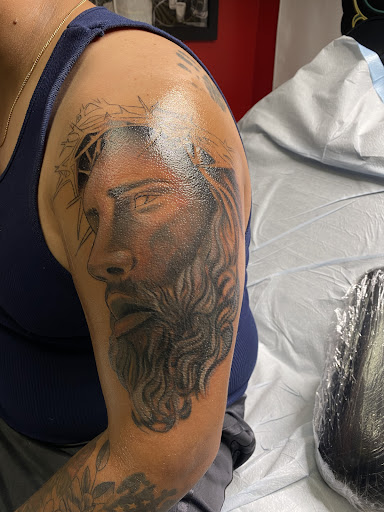 Find guy best friend tattoo ideas for your next unique tattoo in Junction City at New Era Tattoo Studio